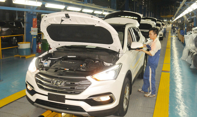 Doanh nghiệp nội kiến nghị giảm thuế nhập khẩu linh kiện để giảm giá thành xe, cạnh tranh công bằng với xe nhập khẩu nguyên chiếc. Ảnh: Tuấn Nguyễn.