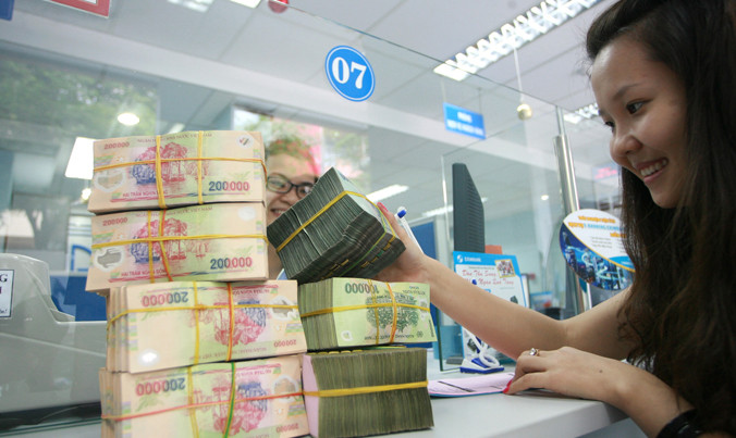 Rút ngắn thời gian giao dịch giữa ngân hàng với người dân và doanh nghiệp cũng là một điểm cộng trong CCHC ngành.