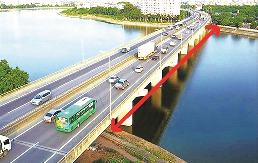 Dự án đường Vành đai 3 dưới thấp vượt hồ Linh Đàm (theo mũi tên) sẽ được Ban QLDA Giao thông khởi công trong năm nay Ảnh: T.Đảng