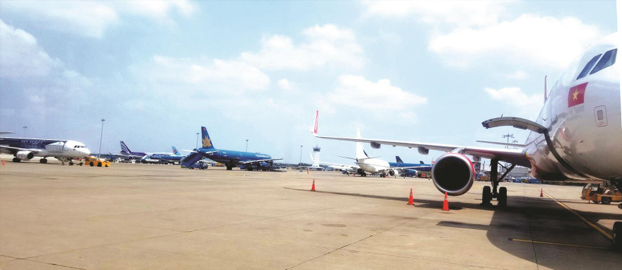 Sân bay Tân Sơn Nhất (TPHCM) là 1 trong 6 sân bay có lãi của ACV để bù lỗ cho 15 sân bay còn lại trên cả nước doanh nghiệp này được giao quản lý, vận hành. Ảnh: Phạm Thanh 