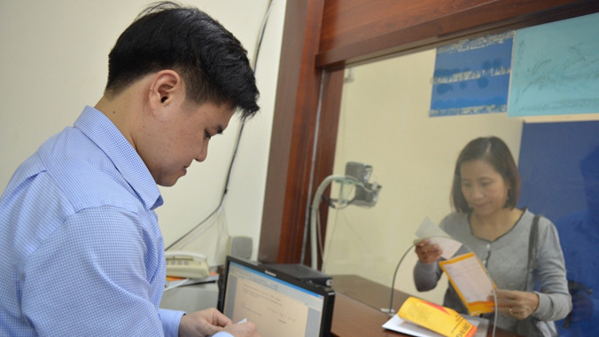 Buổi cấp GPLX quốc tế đầu tiên tại Tổng cục Đường bộ có số lượng người tham gia hạn chế. Ảnh: Minh Quang