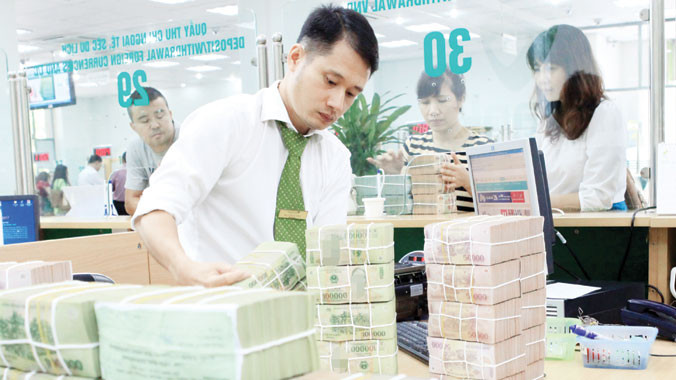 4 năm tái cơ cấu, không có ngân hàng phá sản, chỉ bị mua lại 0 đồng. Ảnh: Trần Việt