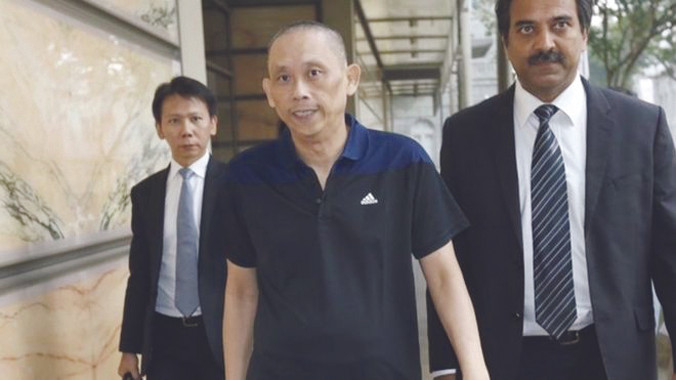 Dan Tan (giữa) khi được trả tự do hồi tuần trước. Ảnh: AP