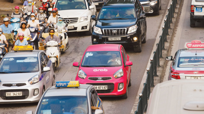 Taxi truyền thống “tố” Uber, Grab