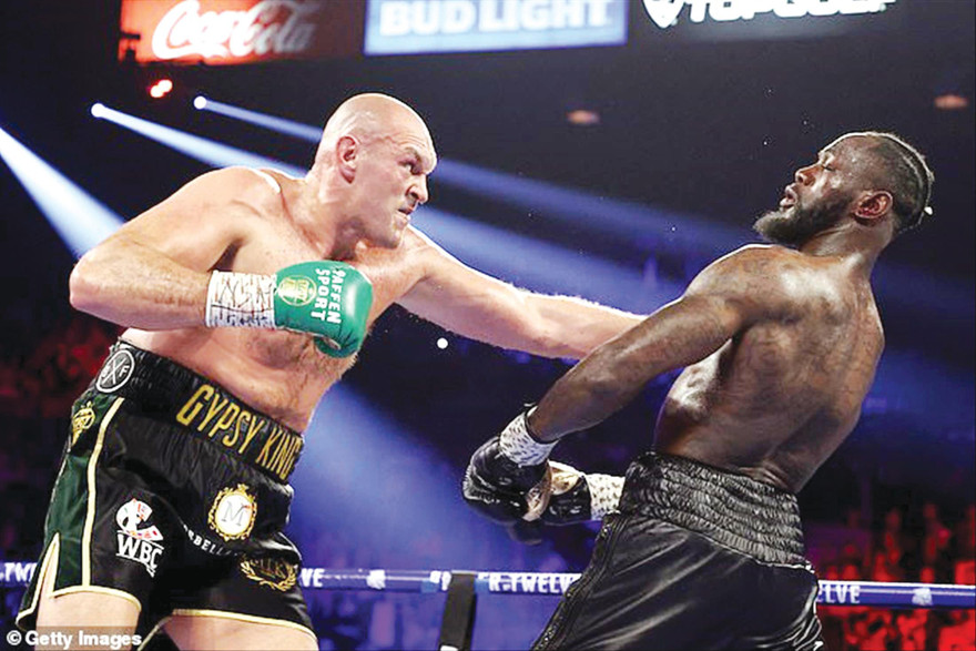 Fury (trái) vàWilder sẽ tái đấu vào ngày 24/7