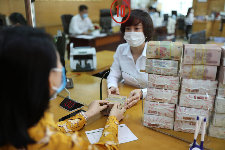 Lãi suất đã giảm có lợi phần nào cho doanh nghiệp vượt khó Ảnh: Như Ý