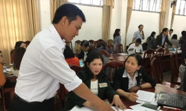 Giáo viên tập huấn chương trình giáo dục phổ thông 2018 Ảnh: NGHIÊM HUÊ