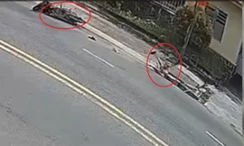 [Clip] Giải cứu hai cha con đi xe máy lọt xuống cống thoát nước trên đường ở TPHCM