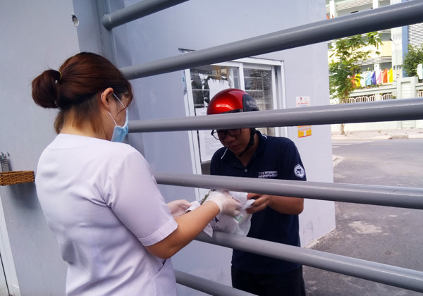 Bên trong khu cách ly nhiều người nước ngoài nghi nhiễm Covid -19 ở TPHCM ảnh 6