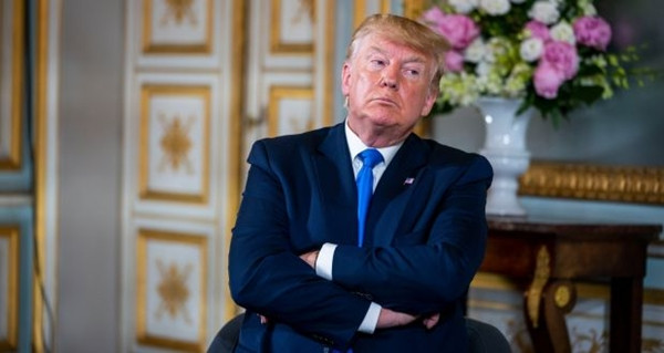 Một bức ảnh phóng viên Mills chụp Tổng thống Trump. Ảnh: Doug Mills/ Thời báo New York. Tổng thống Trump càng thêm bực: Những người được ông quý mến lại quay ra xô xát với nhau ảnh 4
