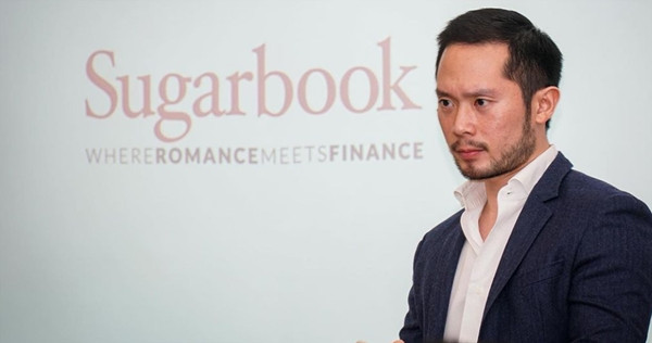 "Slogan" của Sugarbook là "Khi tình gặp tiền". Ảnh: Daily Star. CEO ứng dụng hẹn hò tìm “sugar daddy” bị bắt, phương châm “tình đi đôi với tiền” sụp đổ ảnh 2