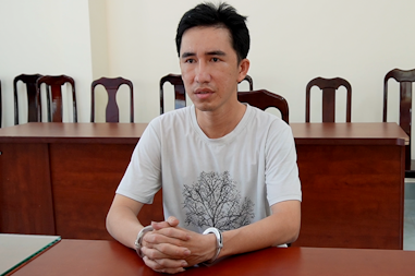 Nguyễn Hữu Thêm tại cơ quan công an. Ảnh: Công an cung cấp.