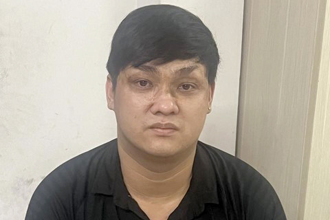 Trần Ngọc Tùng tại cơ quan công an (Ảnh: CATP).