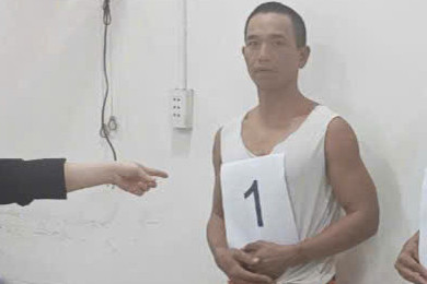 Lê Hồng Phong lúc bị bắt. Ảnh: C.A. Lê Hồng Phong lúc bị bắt. Ảnh: C.A.