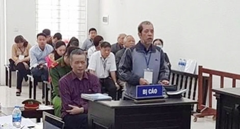 Bị cáo Nguyễn Huy Khang và Nguyễn Đình Bang tại phiên xét xử trước đó.