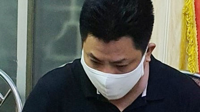 Phạm Phi Long tại cơ quan công an, ảnh: công an cung cấp.