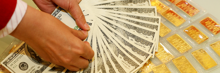 Giá vàng và USD đồng loạt giảm giá, ảnh minh hoạ 