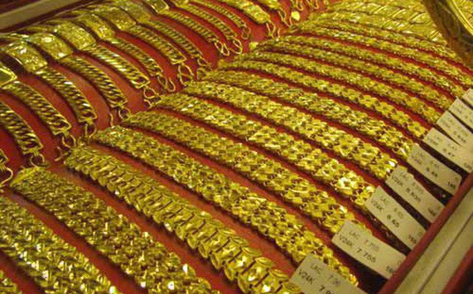 Vì sao giá vàng đột ngột giảm gần 1 triệu đồng/lượng ?