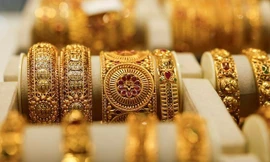 Dấu hiệu thận trọng về giá vàng, cổ phiếu