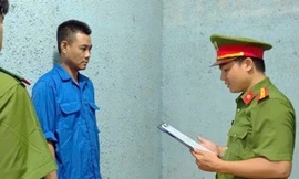 Cơ quan chức năng đọc lệnh khởi tố, bắt tạm giam Nguyễn Ngọc Quang.