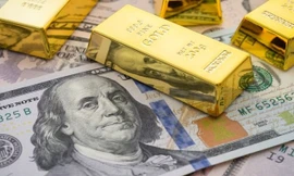 Vàng trượt giá, USD tăng mạnh sau quyết định của Fed