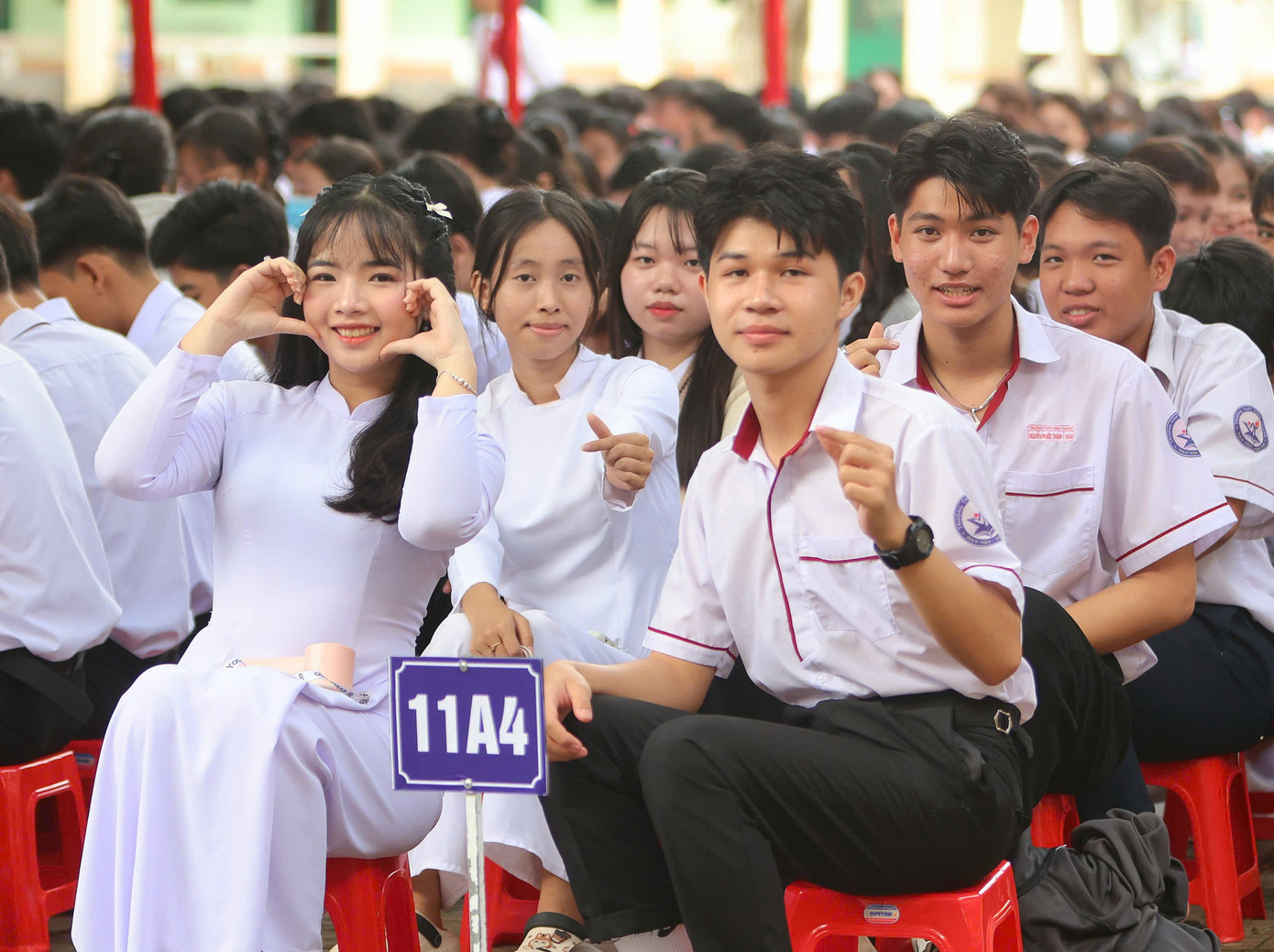 Studenti střední školy Vinh Thanh se těší na nový školní rok. z6978430216377-d06400b900759f7018dc3afdfea769d8.jpg