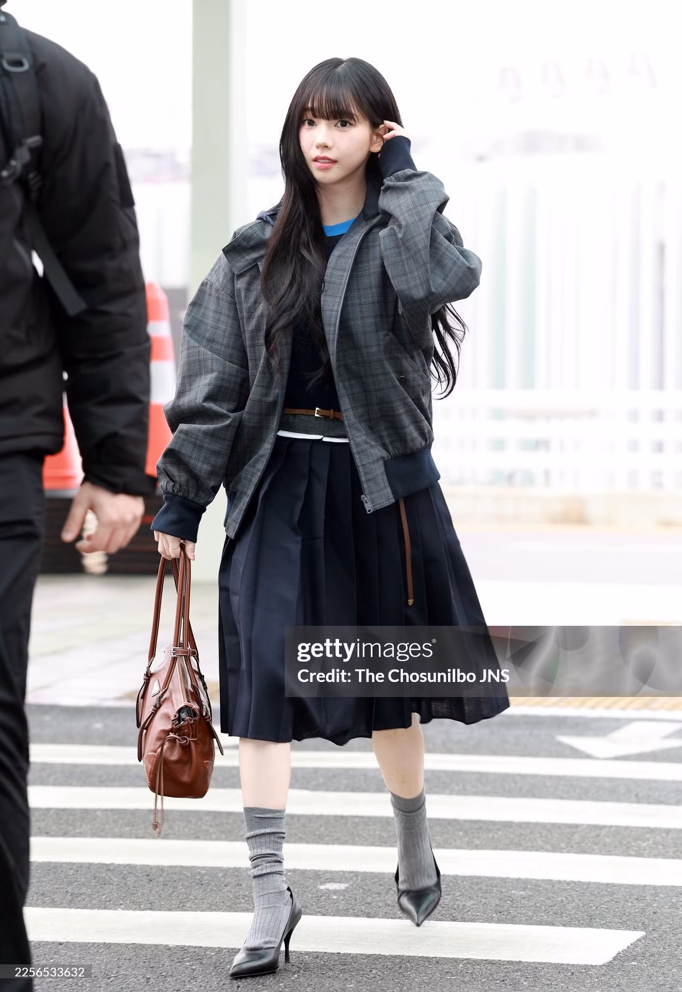 milan-fashion-week-prada-mens-fall-winter-2026-aespas-karina-airport.jpg