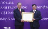 Lào trao tặng Tổng Bí thư Tô Lâm Huân chương Vàng Quốc gia