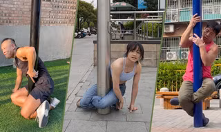 Thử thách leo cột đèn ngồi bắt chéo chân lan truyền chóng mặt ở Trung Quốc