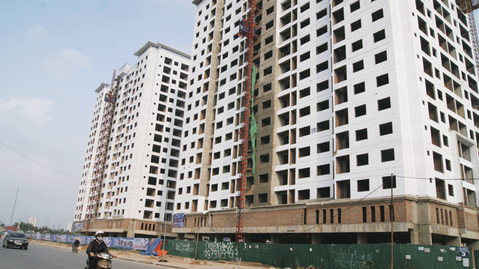 Doanh nghiệp kinh doanh BĐS cho rằng, mức thu nhập 7,6 triệu đồng Bộ LĐ-TB&XH công bố là không tưởng. Ảnh: Lê Hữu Việt