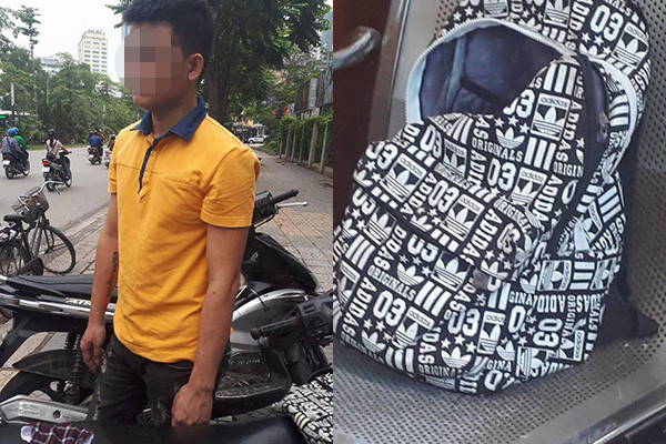 Nam thanh niên bị giữ lại cùng chiếc túi của cô gái.