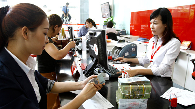 Ngân hàng đã nỗ lực để đẩy vốn vào nền kinh tế. Ảnh: Như Ý