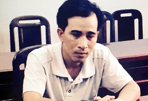 Thanh tại cơ quan điều tra. Ảnh: Quốc Thắng