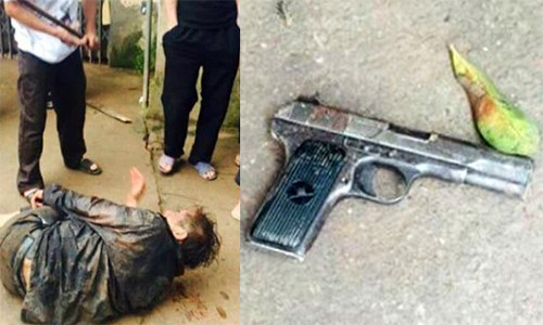 Võ Văn Tính bị người dân bắt giữ và khẩu súng