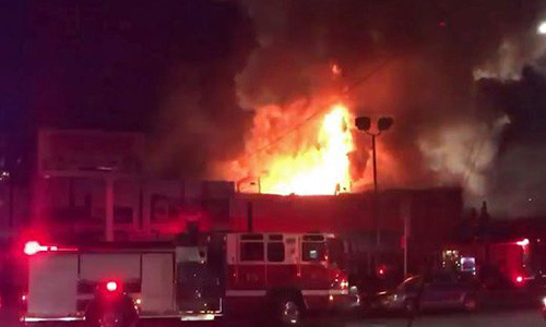 Vụ cháy xảy ra khi nhiều người đang tham dự buổi tiệc khiêu vũ. Ảnh: USA Today.