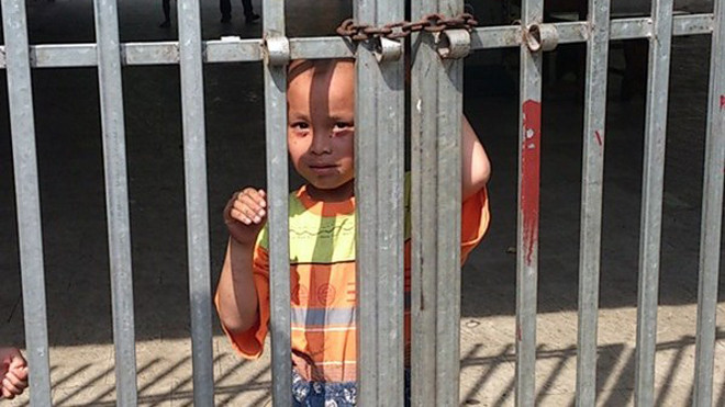 Một em nhỏ tại chùa Bồ Đề. Ảnh: Tuấn Nguyễn