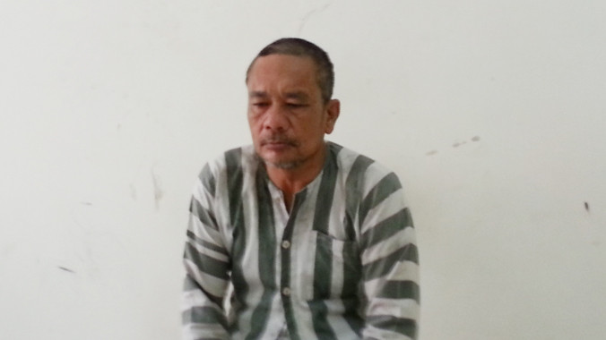 Tống Đình Văn tại cơ quan công an.