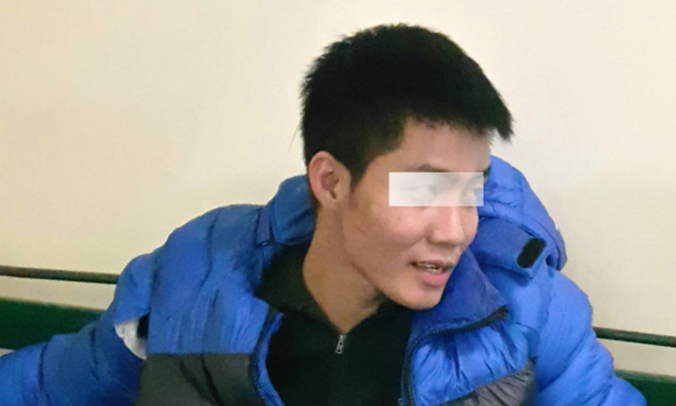 Minh tại cơ quan công an.