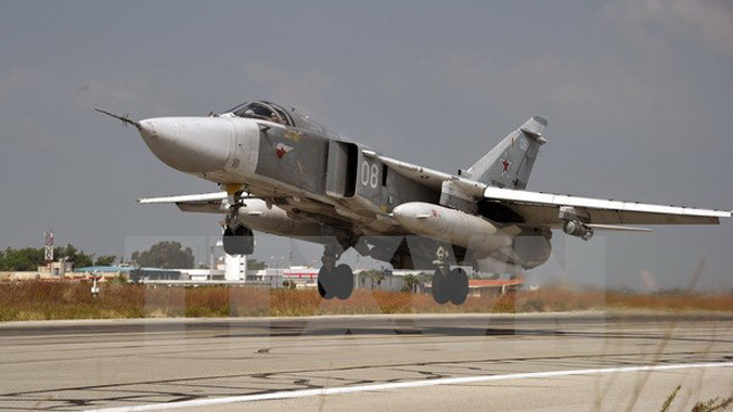 Máy bay chiến đấu Su-24 của Nga tại căn cứ quân sự Hmeymim, tỉnh Latakia, Syria ngày 21/10. Nguồn: THX/TTXVN.