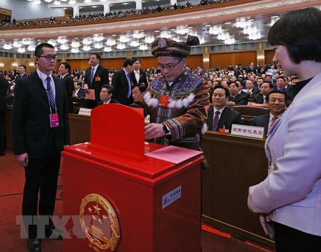 Đại biểu bỏ phiếu tại hội nghị. (Nguồn: THX/TTXVN) 