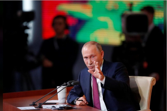 Tổng thống Nga Putin trả lời các câu hỏi trong cuộc họp báo hôm 14/12. Ảnh: Reuters