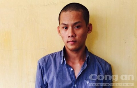 Đối tượng Bùi Trung Tín tại cơ quan công an - Ảnh: Nguyễn Thúy