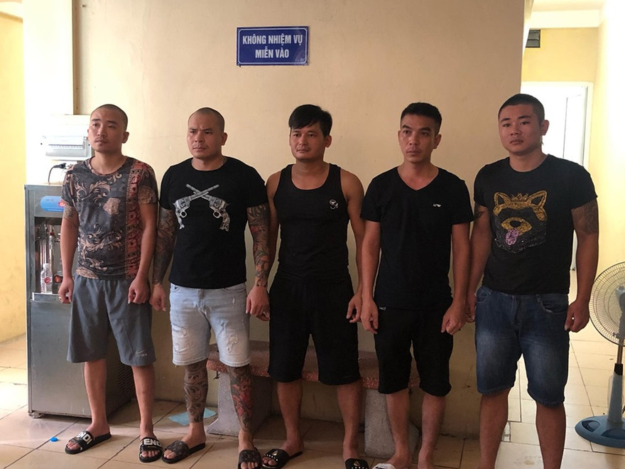 Quang "Rambo" cùng các đối tượng bị bắt giữ.