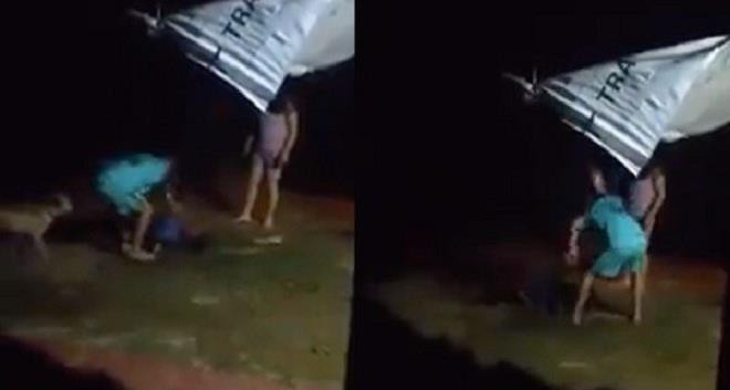 Người đàn ông bị vợ và con trói, đánh gây bức xúc. Ảnh cắt từ clip
