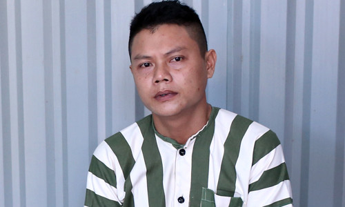 Hùng tại cơ quan công an. Ảnh: Nguyệt Triều