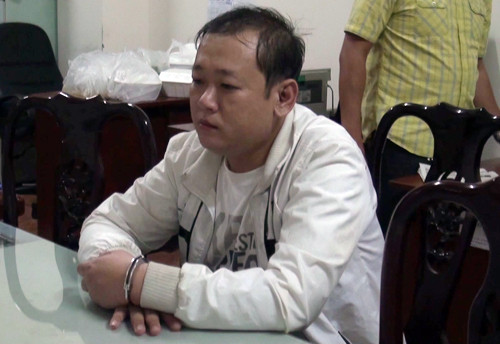 Vũ tại cơ quan điều tra. Ảnh: Q.T