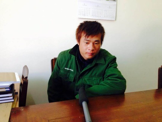 Đối tượng Nguyễn Văn Tiến tại cơ quan điều tra. Ảnh: Hữu Trường