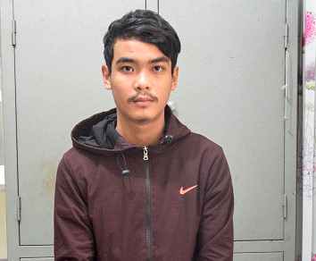 Phan Xuân Thông tại cơ quan điều tra. Ảnh: Công an cung cấp