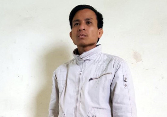 Nguyễn Văn Tám tại cơ quan điều tra. Ảnh: Công an nhân dân