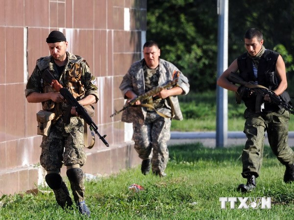 Các tay súng thuộc phe ly khai. (Nguồn: AFP/TTXVN)